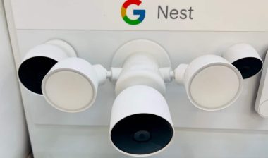 Google Nest flood light with camera on display inside a big box store.