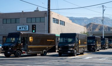 UPS (United Parcel Service) drivers and delivery trucks. Residential delivery service.