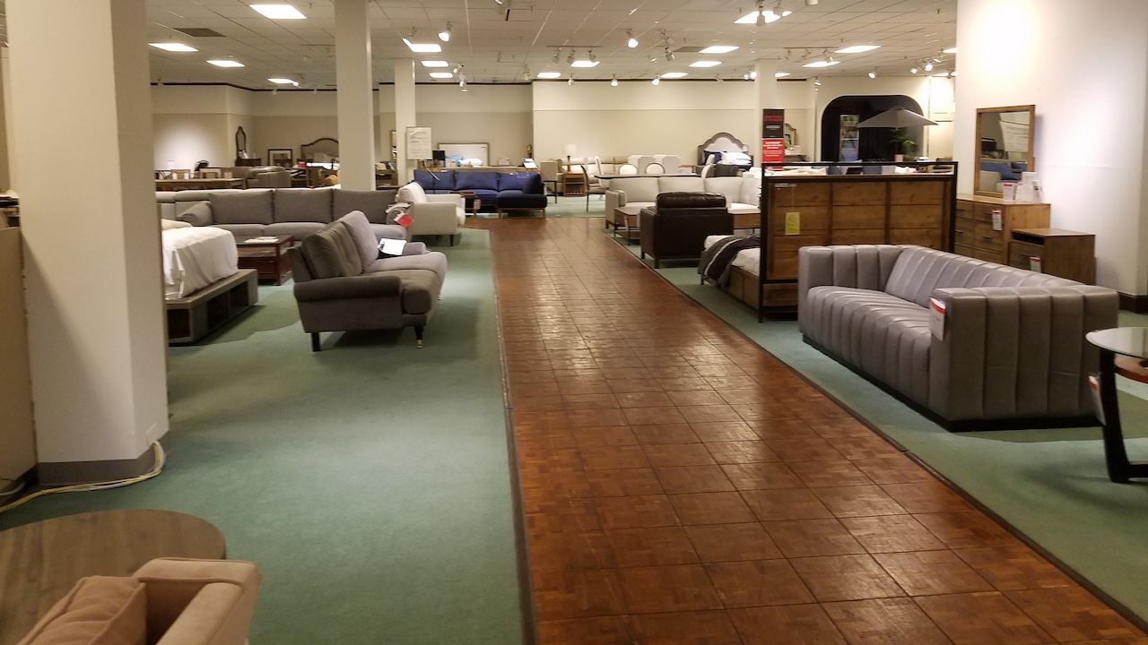 the furniture and bedding department inside of the Macy's store at the Lima Mall