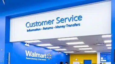 Wide-angle shot of customers at a Walmart customer service desk