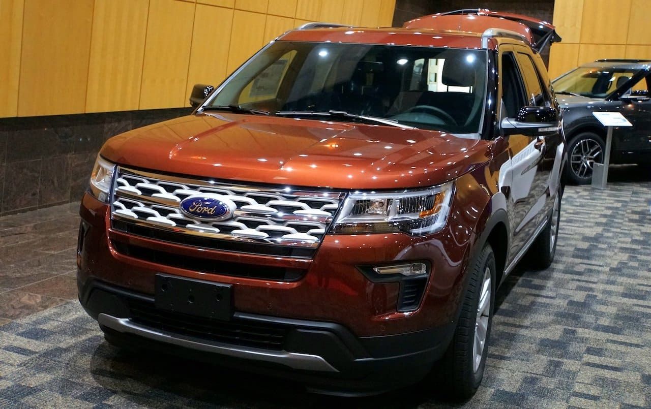 A brand new 2019 Ford Explorer in dark metallic orange