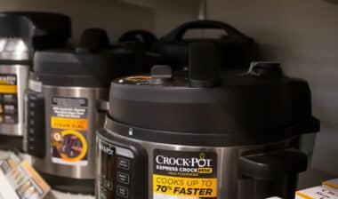 A view of several Crock Pot slow cooker appliances on display at a local department store.