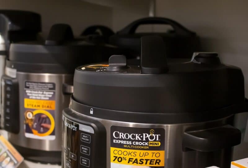 A view of several Crock Pot slow cooker appliances on display at a local department store.