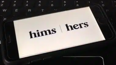Hims logo on a smartphone.