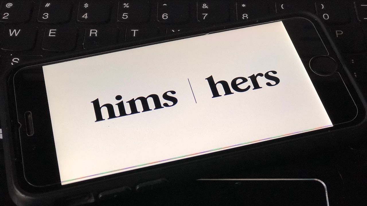 Hims logo on a smartphone.