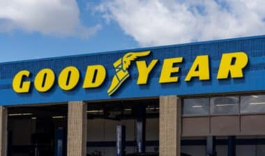 Close up of the Goodyear logo sign on the building.