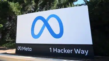 Meta logo sign near Meta Platforms headquarters on 1 Hacker Way.