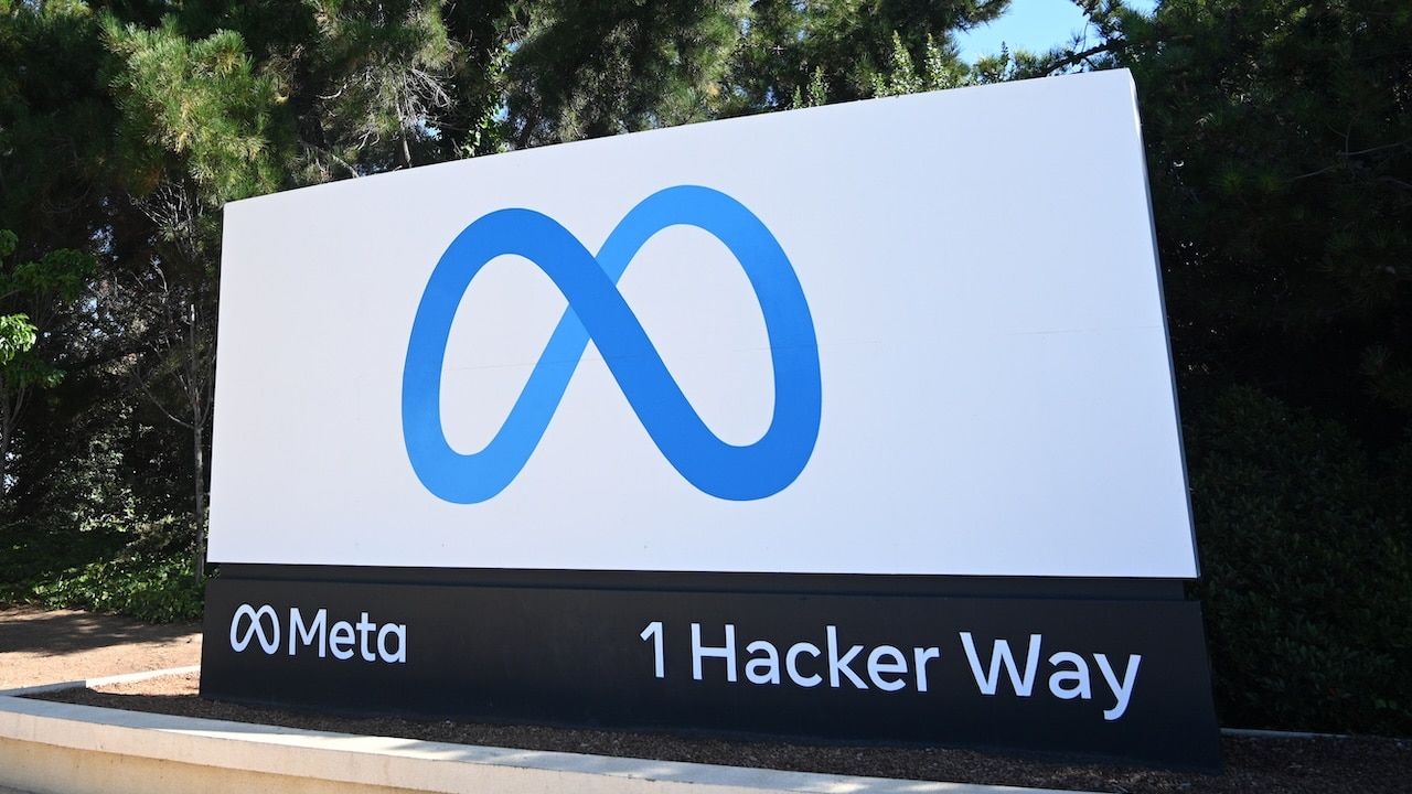 Meta logo sign near Meta Platforms headquarters on 1 Hacker Way.