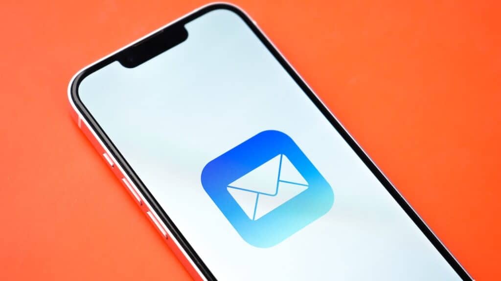 Apple mail app on phone screen stock image.