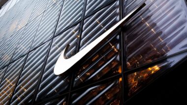 NIKE logo sign on the company store facade on 5th Ave. in Manhattan, NYC.