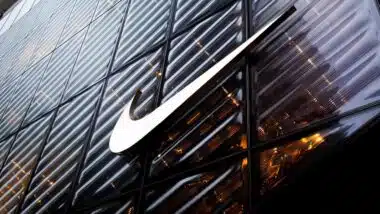 NIKE logo sign on the company store facade on 5th Ave. in Manhattan, NYC.