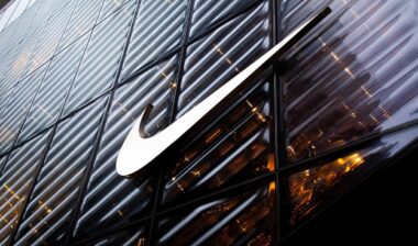 NIKE logo sign on the company store facade on 5th Ave. in Manhattan, NYC.