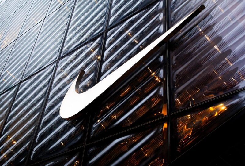 NIKE logo sign on the company store facade on 5th Ave. in Manhattan, NYC.
