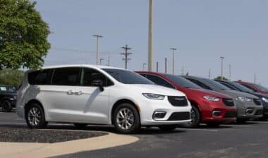 Chrysler Pacifica minivan at a dealership.