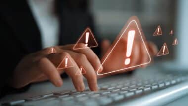 Cybersecurity alert warning showing red cyber for data breach