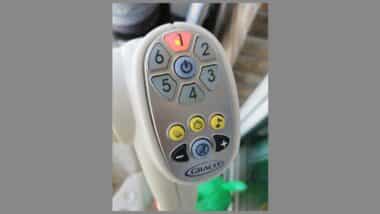 A close-up of the Graco baby swing's control panel