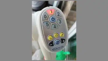 A close-up of the Graco baby swing's control panel