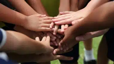 group of young people's hands
