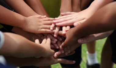 group of young people's hands