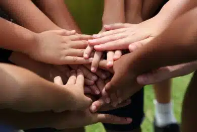 group of young people's hands
