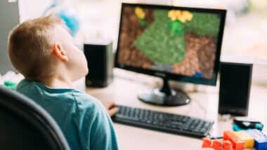 Boy Playing In Computer Games