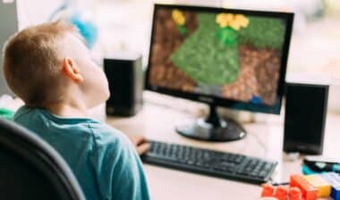 Boy Playing In Computer Games