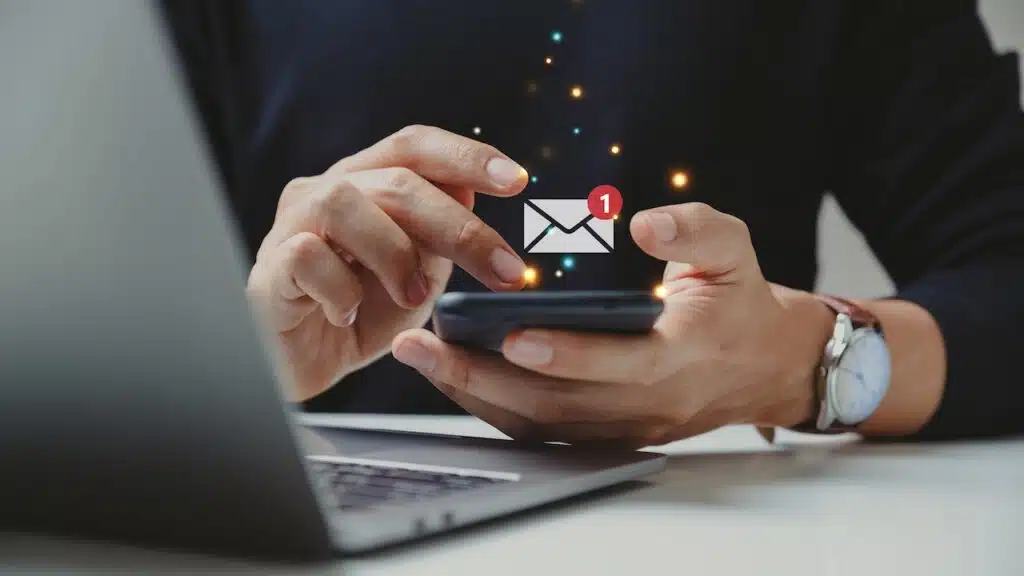 Hand of businessman using smartphone for email with notification alert, Online communication concept.