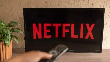 TV Television Netflix logo on screen with home remote control.