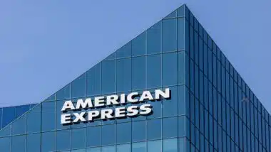 The American Express name sign without the logo on a glass high rise office building
