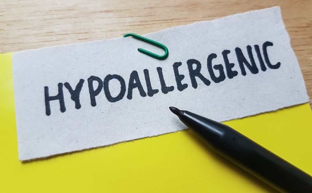 Hypoallergenic writting on table background.