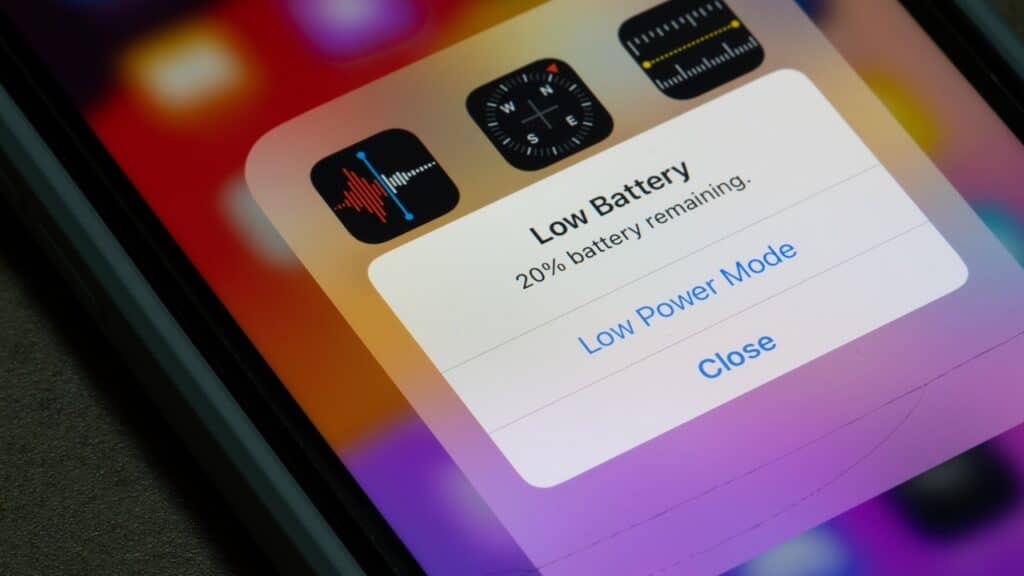Low Battery warning is seen on the screen of an iPhone