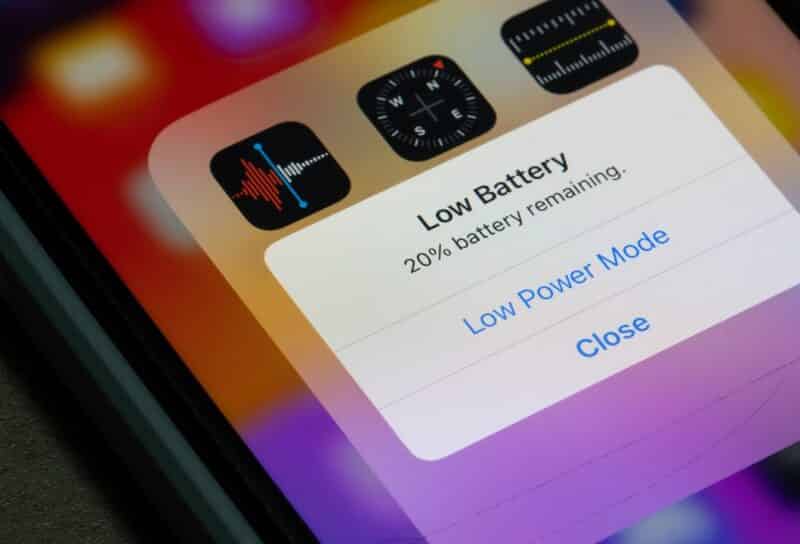 Low Battery warning is seen on the screen of an iPhone