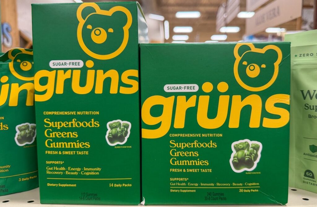 Grüns Superfoods Greens Gummies Boxes on Grocery Shelf.