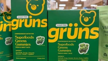 Grüns Superfoods Greens Gummies Boxes on Grocery Shelf.