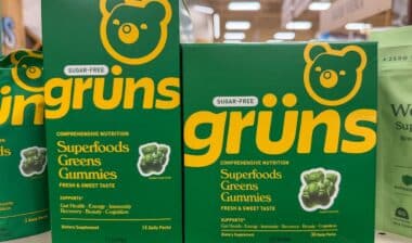 Grüns Superfoods Greens Gummies Boxes on Grocery Shelf.