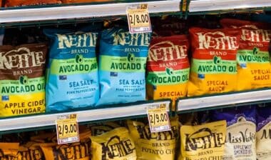 Bags Of Kettle Brand Potato Chips Displayed On Store Shelf In Snack Foods Aisle