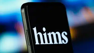 hims logo is seen on a smartphone.