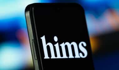 hims logo is seen on a smartphone.