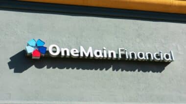 OneMain Financial sign of the provider of personal installment loans on the local branch office in the strip mall