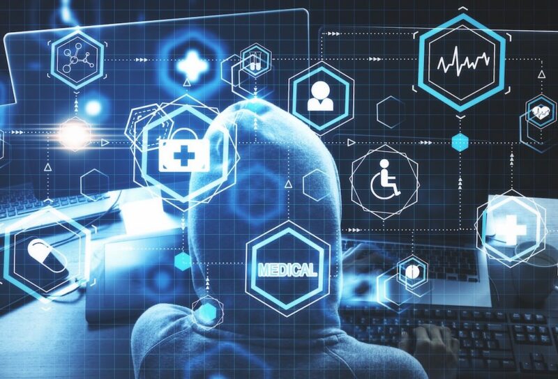 Medicine and technology concept. Hacker