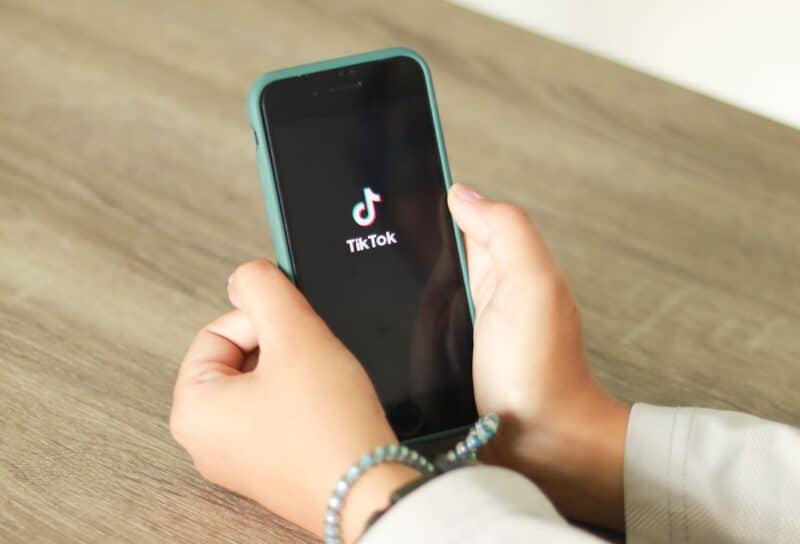 TikTok on phone in child's hands