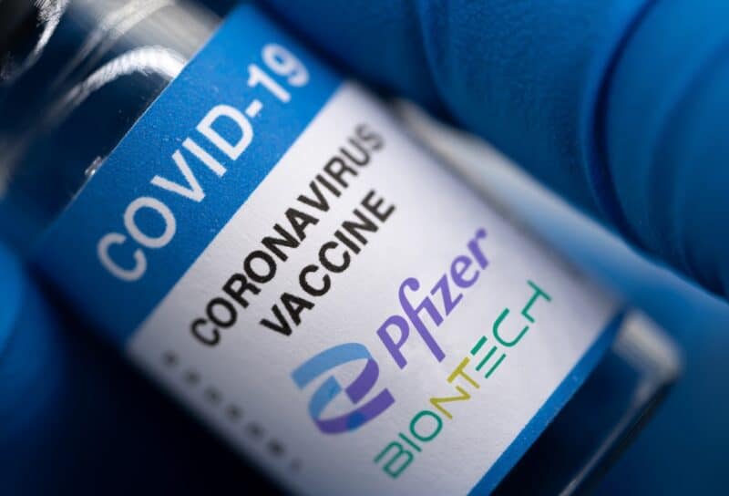 Covid-19 vaccine with Pfizer logo.
