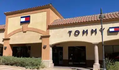 Tommy Hilfiger sign, logo on the store facade at Desert Hills Premium Outlets mall - Cabazon, California, USA