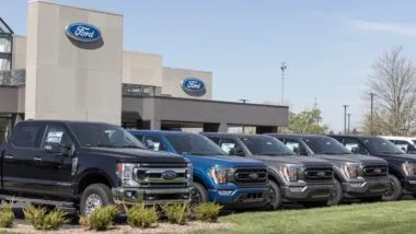 Ford F-250 and F-150 display at a dealership.