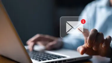 Email marketing concept, person reading e-mail on laptop computer