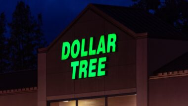 bright green illuminated Dollar Tree sign on the Dollar Tree store building