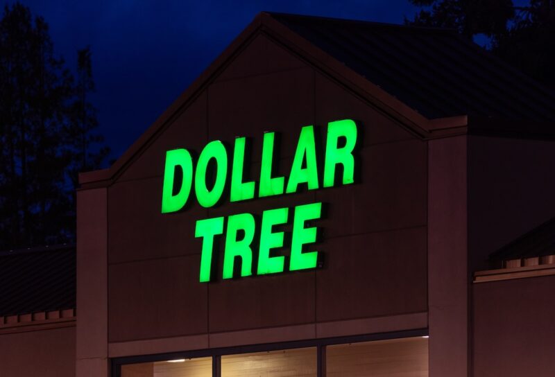 bright green illuminated Dollar Tree sign on the Dollar Tree store building