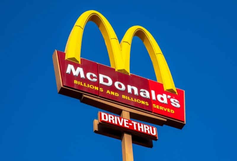 McDonald's burger fast food restaurant. Sign, logo, angle view