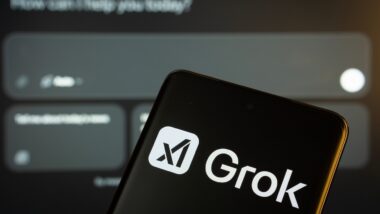 Grok Ai logo is seen on a smartphone.