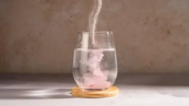 adding mix to glass of water